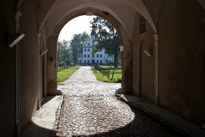 Facade of Kletkamp mansion from arch in Schleswig-Holstein, Germany