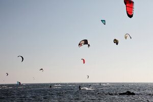 Kitesurfer doing kite surfing an Baltic Sea Coast in Fehmarn, Ostholstein, Germany 