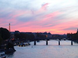 Ferry moored beside Pont Neuf in Seine river, Paris, France