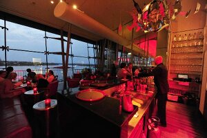 People dining at Le Ciel Restaurant Bar & Lounge in Le Royal Meridien, Hamburg, Germany