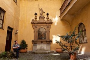 Wall fountain in Eserhauses in Maximilian Street, Augsburg, Bavaria, Germany