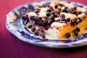 Close-up of blueberry cake piece on plate