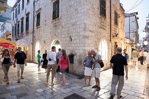 People walking on old town streets of Dubrovnik, Croatia