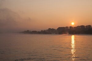 View of sunrise at river Rhein, Oestrich-Winkel, Hesse, Germany