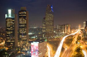 View of skyline of Levent and Buyukdere at night, Istanbul, Turkey