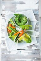 Vegetable sticks and a pea dip with feta cheese