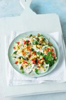 Mozzarella carpaccio with diced vegetables and pineapple