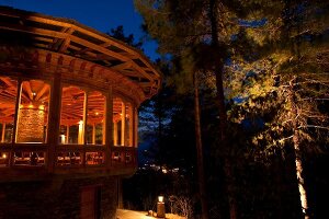 Illuminated Uma Paro hotel at night, Bhutan