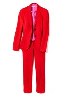Red jersey suit with pink silk blouse on white background
