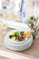 Salad with quail's eggs, shrimps and rabbit-shaped toast