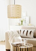 A lamp with a crocheted lampshade