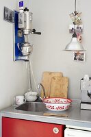 A sink and kitchen utensils in a student kitchen