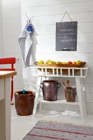 Shelf of fresh apples in Scandinavian summer house