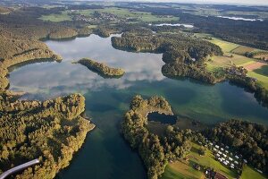 View of castle Hartmannsberg around Eggstatt Hemhofer Lake in Bavaria, Germany