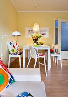 Dining table with children chairs and bench in dining room