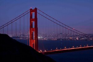 Illuminated Golden Gate Bridge at dusk, San Francisco, California, USA