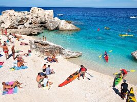 View of people and kayaks at Cala Mariolu, Gulf of Orosei, Sardinia, Italy