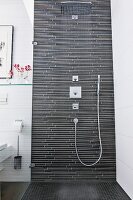 Rain shower stall in bathroom