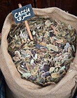 Sack of dried cassia beans in Souk El Tayeb organic market, Beirut, Lebanon