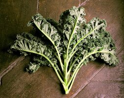 Close-up of fresh kale against white background