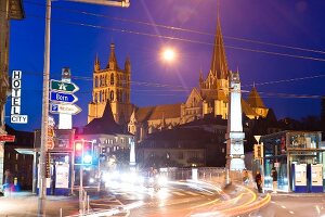 View of houses and Notre-Dame Cathedral at evening in Lausanne, Switzerland