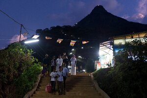 Pilgrims climbing stairs at night in Sri Pada mountain, Sri Lanka
