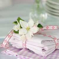 White cloths tied with ribbon