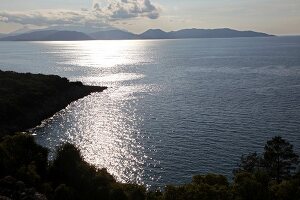 View of sea and mountain at dusk in Dilek Peninsula National Park, Turkey