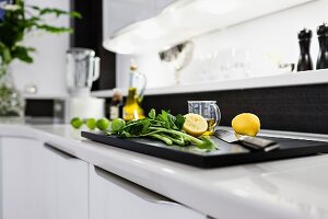 Parsley and Knife on chopping board in kitchen