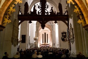 People in music festival at Lubeck Cathedral, Lubeck, Schleswig Holstein, Germany