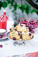 Cherry blondies on a cake stand