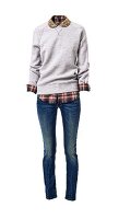 gray sweater over checked shirt and jeans on white background