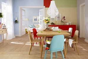 View of dining room overlooking living room in blue