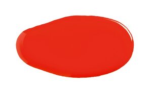  Close-up of dab of coral red nail polish on white background 