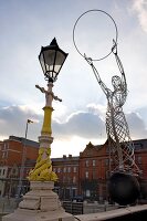 Beacon of Hope and street light at Belfast, Northern Ireland, Low angle view