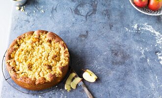 Apple cake with cinnamon crumbles and hazelnuts