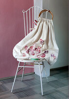 DIY fabric bag with handle on white chair