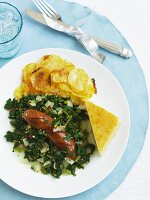 Kielbasa with Wilted Greens, Polenta and Scalloped Potatoes