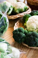 Fresh Broccoli and Cauliflower on Straw Plates