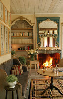 Country-style living room with fireplace and wooden furniture