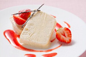 Vanilla parfait garnished with strawberries