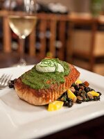 Grilled Salmon with Cilantro Aioli Over Chipotle and Mango Black Beans