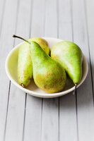 Three pears in a bowl