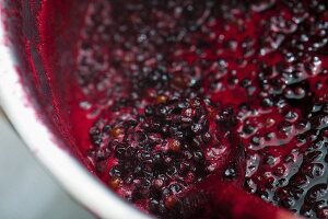 Elderberry jam in a pot (close-up)