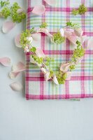 A heart made from rose petals and lady's mantle