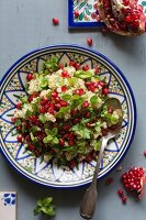 Couscous with pomegranate seeds and mint