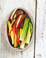 Assorted Vegetable Sticks in an Oval Dish; From Above