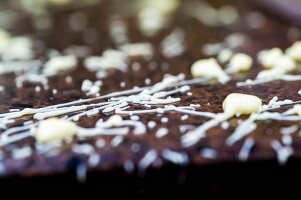 The remains of white chocolate coating for truffles