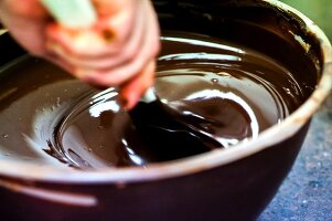 Melted chocolate being stirred