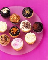 Assorted Cupcakes on a Pink Background